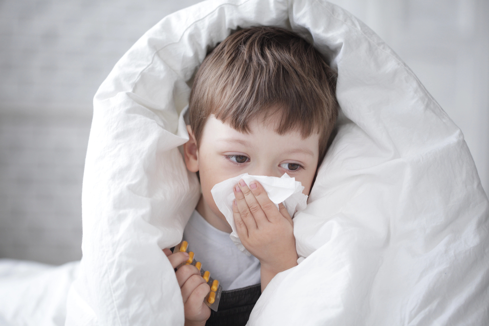 Bambino con influenza